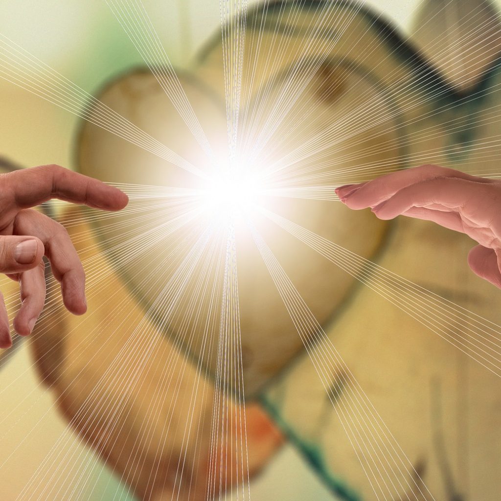 Hands touching each other on heart background