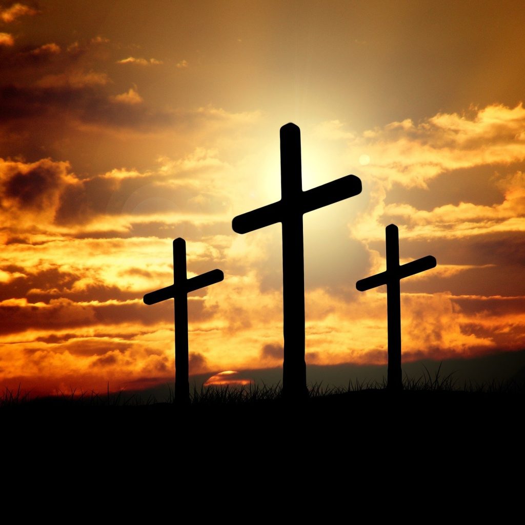 Three crosses planted on a piece of land