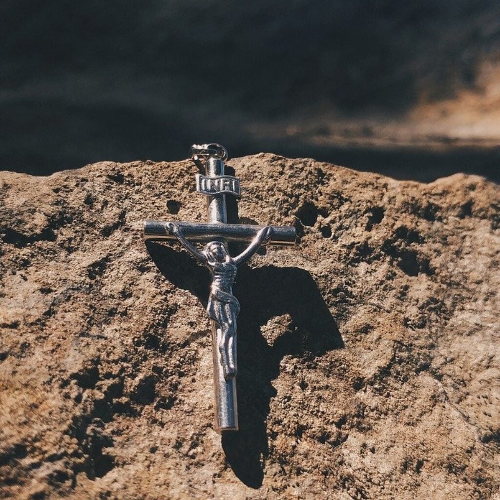 An emblem of the cross on a stone