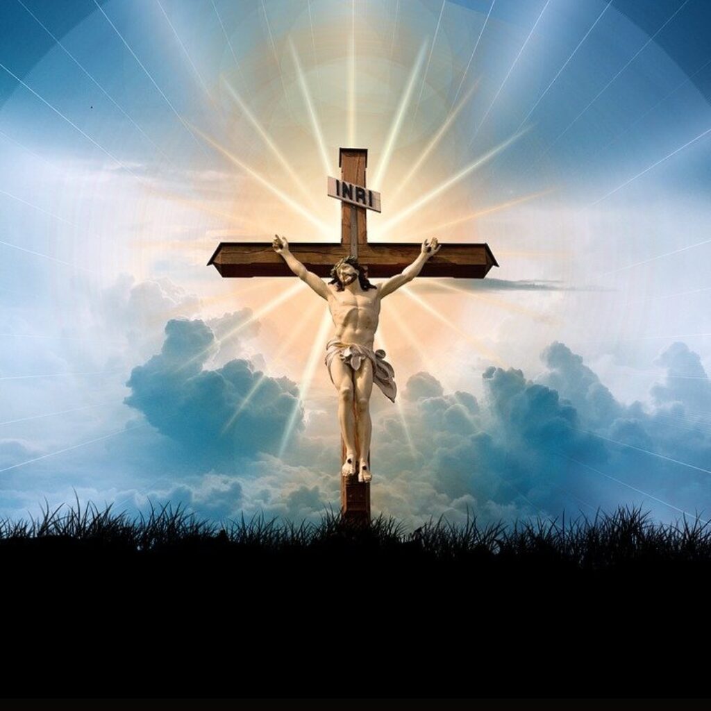Jesus on the cross sunlight background
