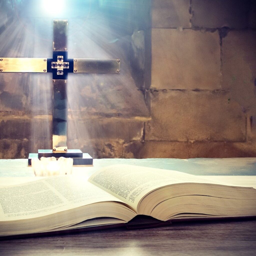 cross and the Holy Bible in a church