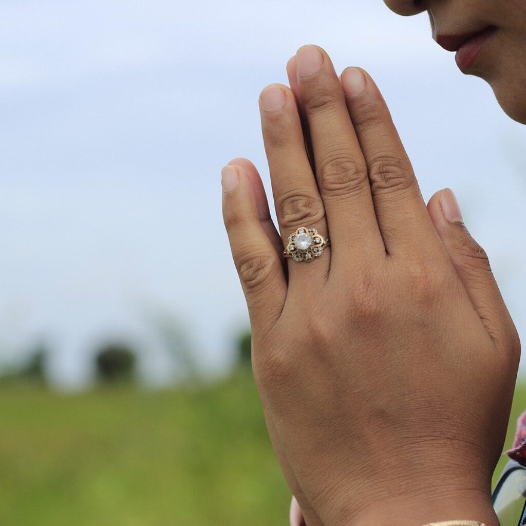 Woman praying outside