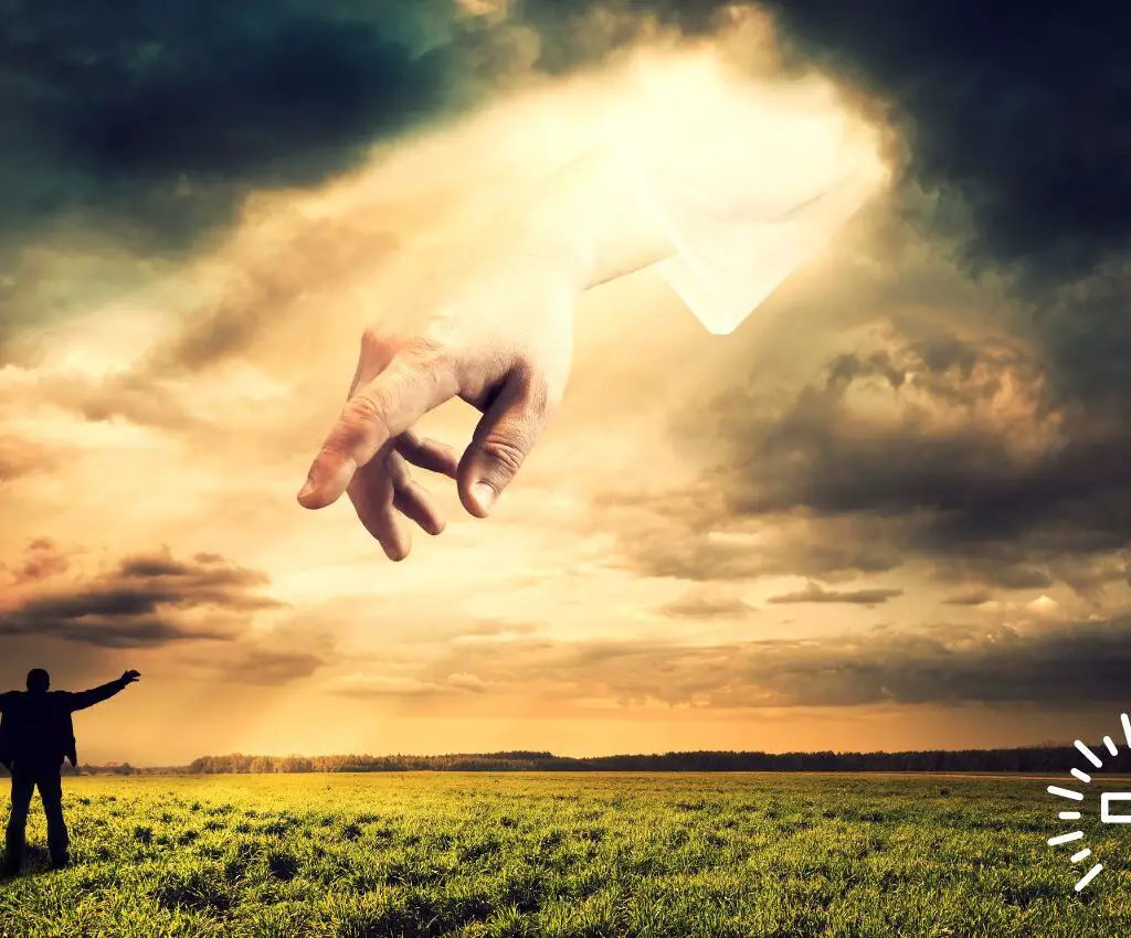 The-Hand-of-God-Touching-A-Man-Standing-in-an-Open-Field