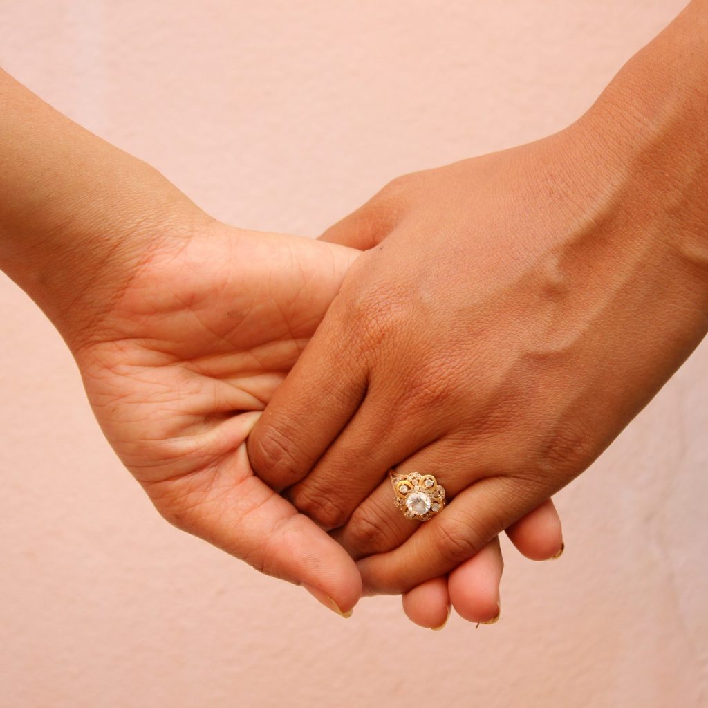 couple holding hands