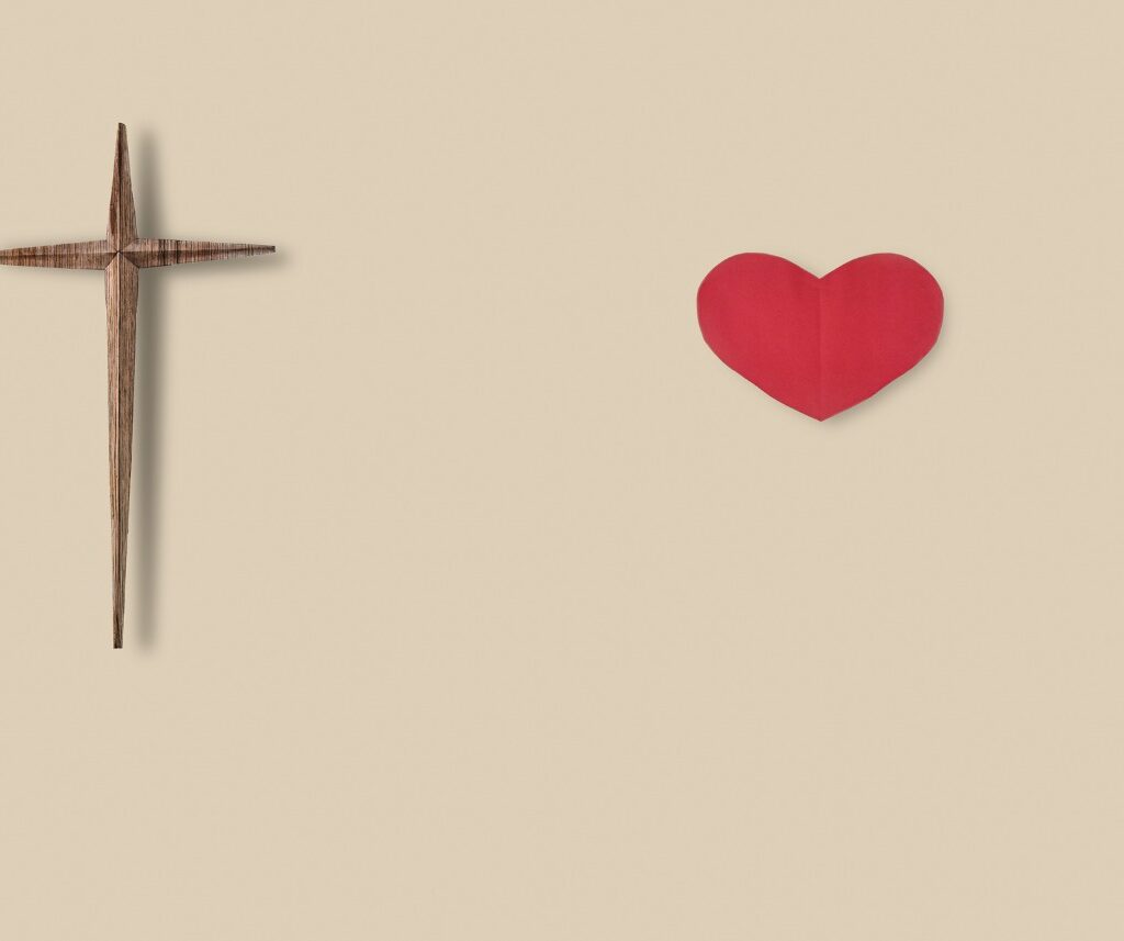 A picture of a heart and a cross