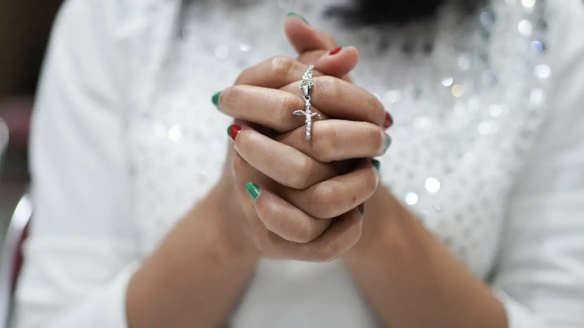 Christian Woman Praying For God Protection in Church