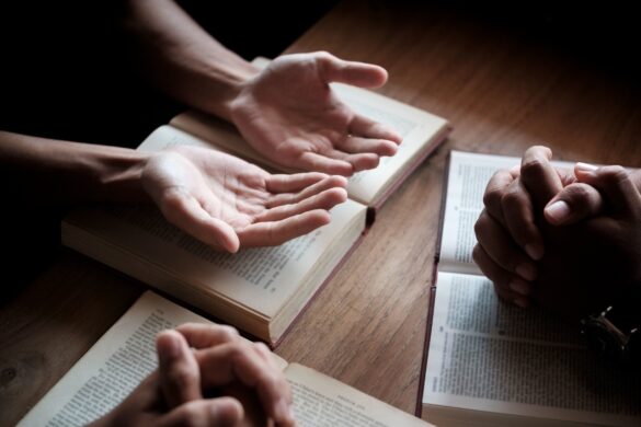 Prayer team praying together at church
