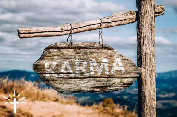 A Sign With The Word Karma on It