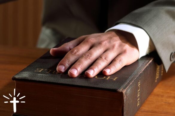 Man With His Hands on The Bible